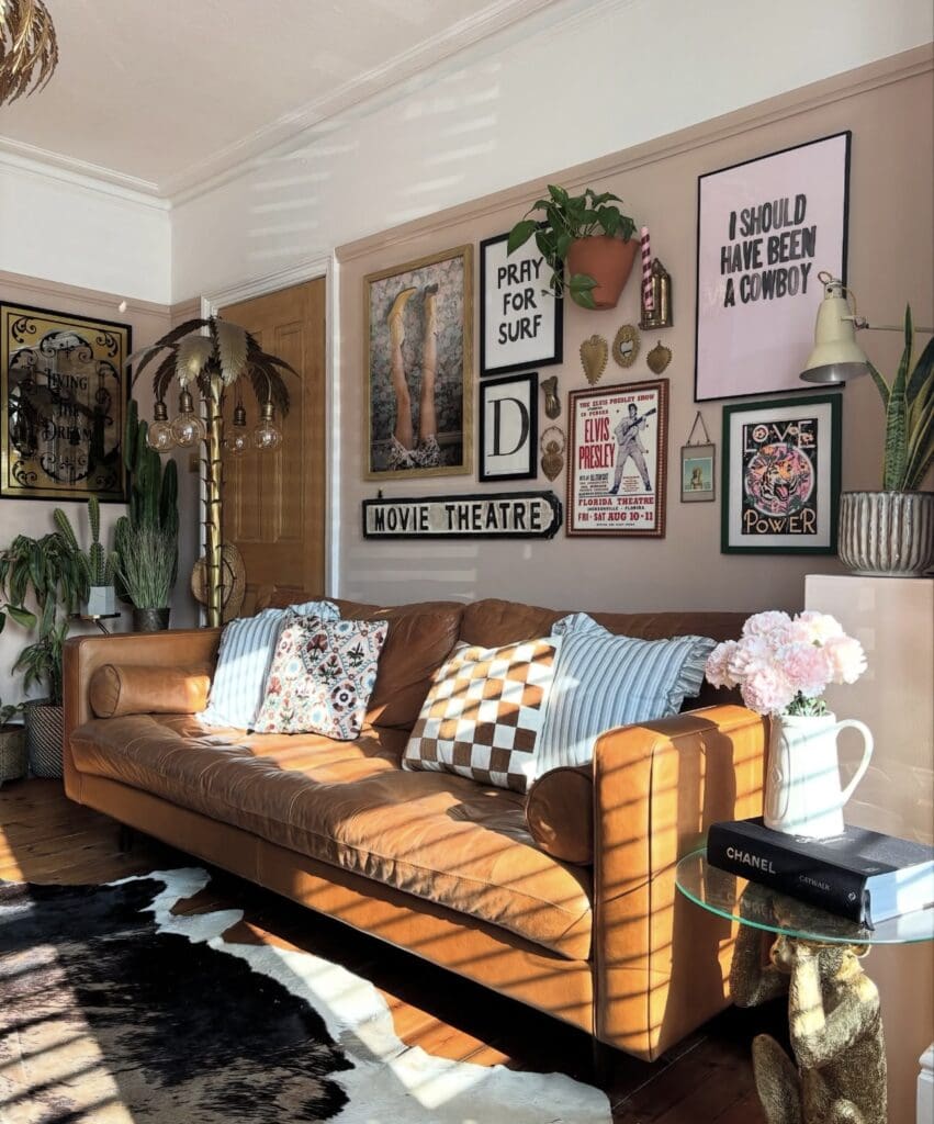 Elegant small art piece hanging on a pared-down small apartment living room wall