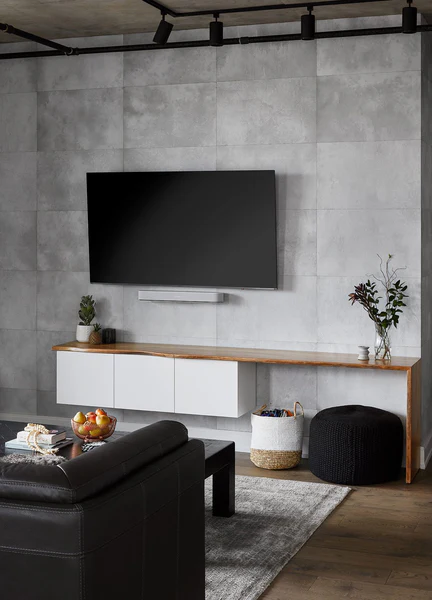 concrete accent wall behind tv industrial style TV Wall Decor Ideas