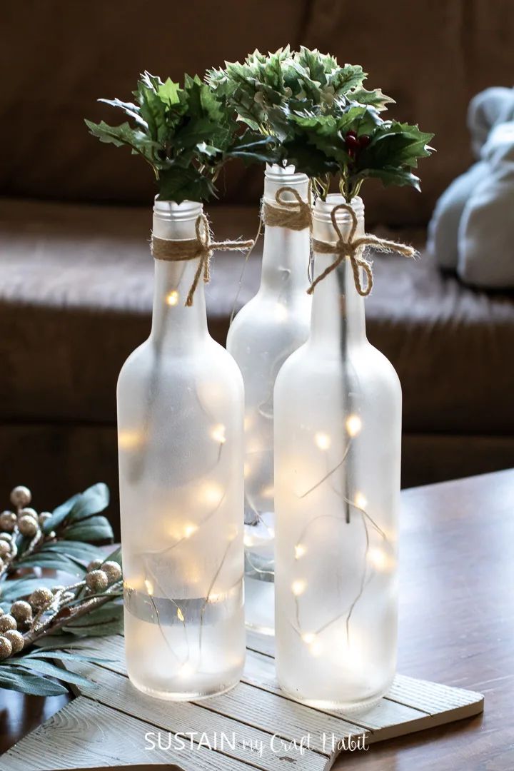 32 Best Winter Craft Ideas for Adults to Try This Season 73 32 Best Winter Craft Ideas for Adults to Try This Season 19 Wine Bottle Centerpiece Winter Craft Ideas for Adults