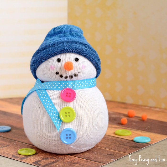 24 Easy & Fun Winter Crafts for Kids of All Ages 60 24 Easy & Fun Winter Crafts for Kids of All Ages No Sew Sock Snowman Craft 1 1 Winter Crafts for Kids