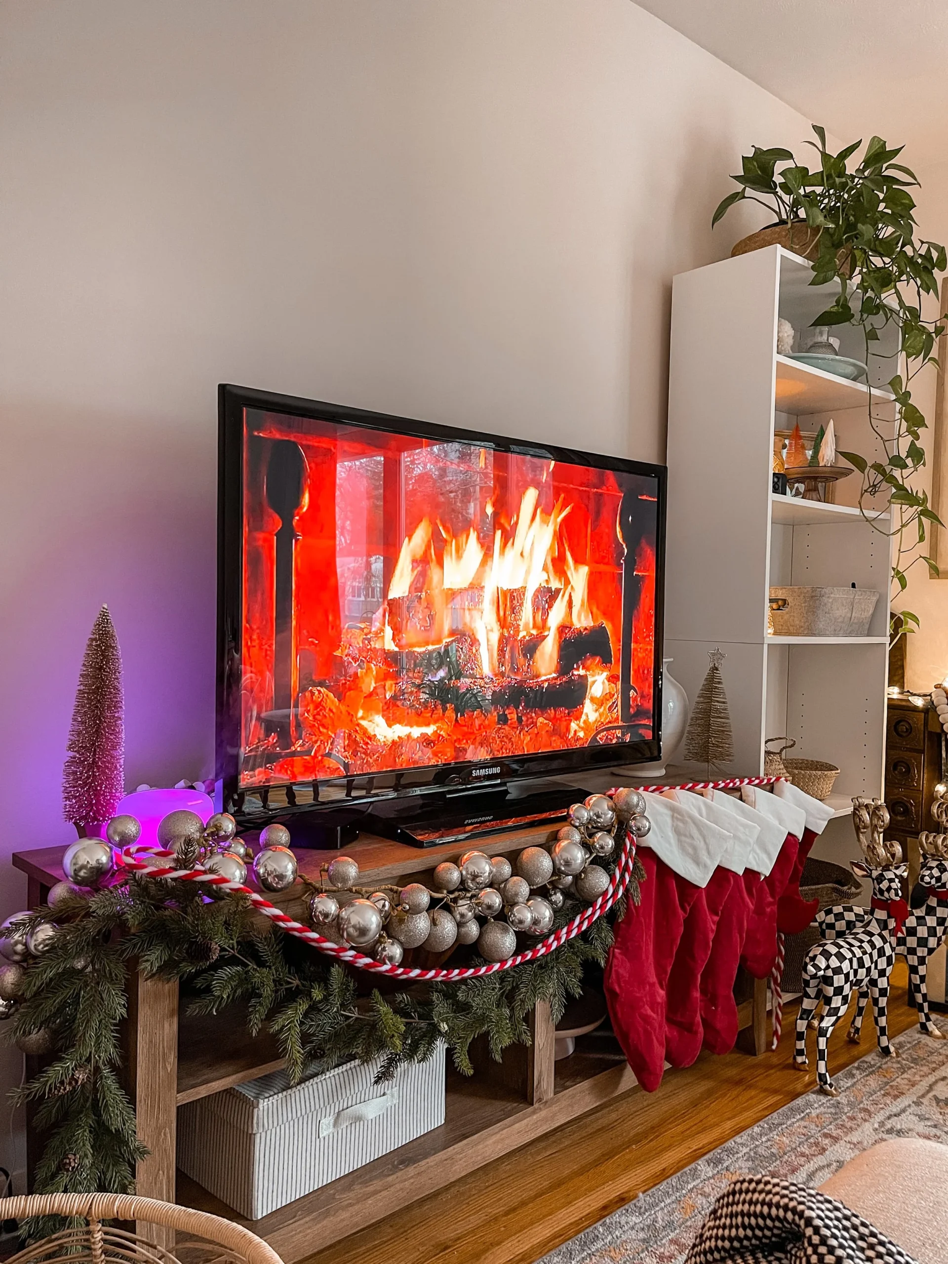 FireontheTV scaled Christmas TV Stand Decor
