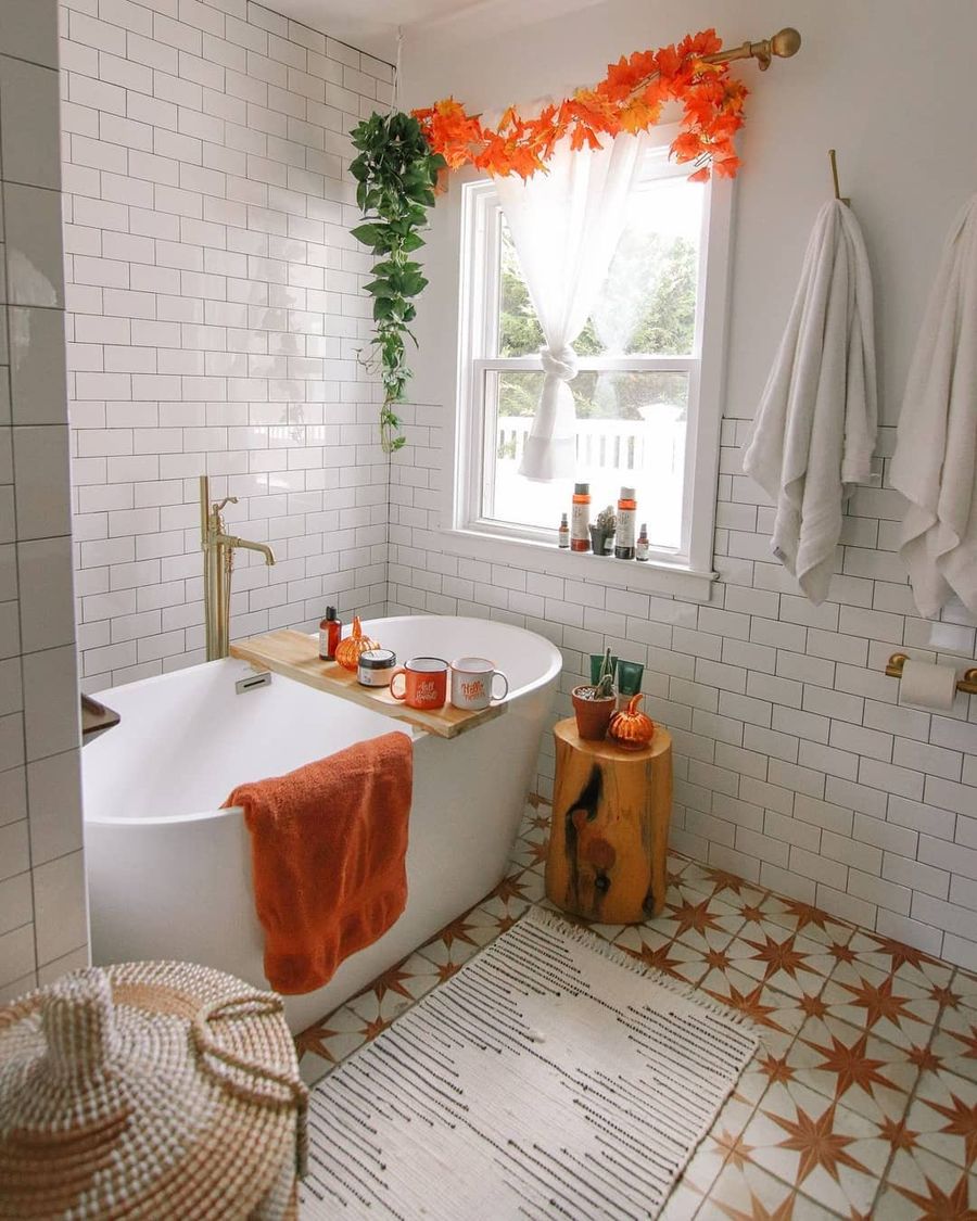 25 Cozy Fall Bathroom Decor Ideas to Refresh Your Space 86 25 Cozy Fall Bathroom Decor Ideas to Refresh Your Space Fall garland on window fall bathroom decor ideas thetinydreamhome Fall Bathroom Decor Ideas