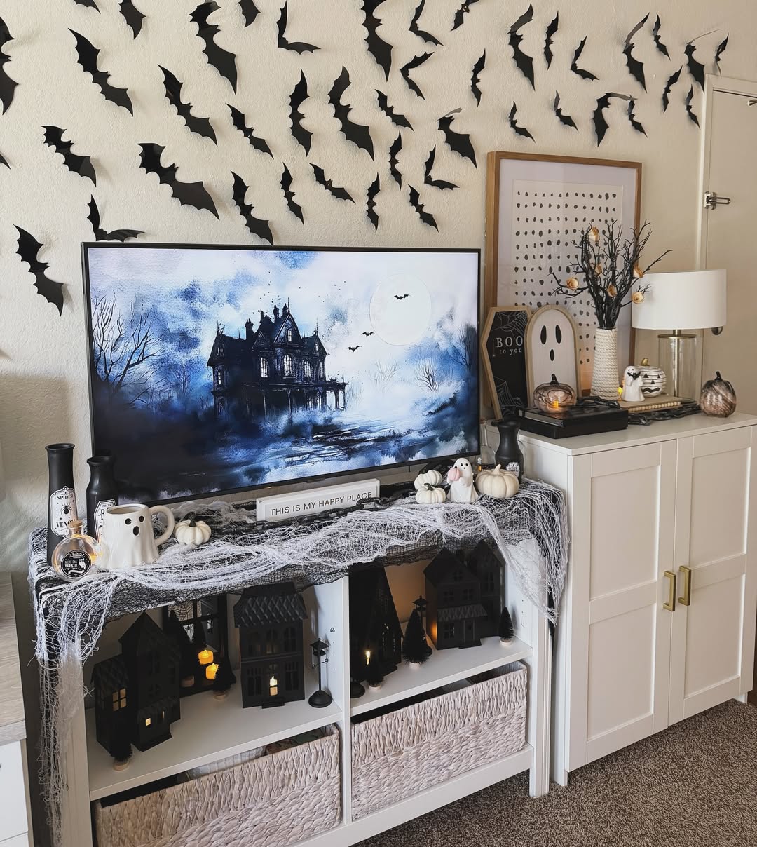 Bat Covered Haunted House Spooky TV Stand Decor Ideas