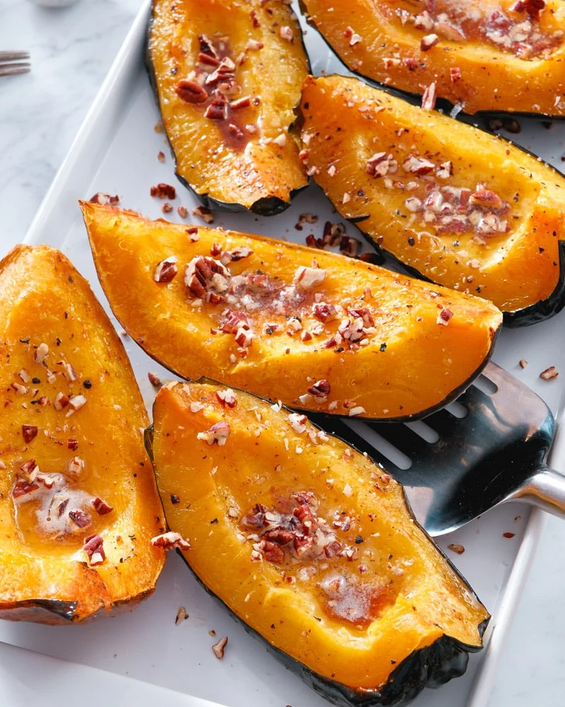 24 Best Thanksgiving Sides You'll Make Every Year 60 24 Best Thanksgiving Sides You'll Make Every Year Roasted Acorn Squash 006 Thanksgiving Sides