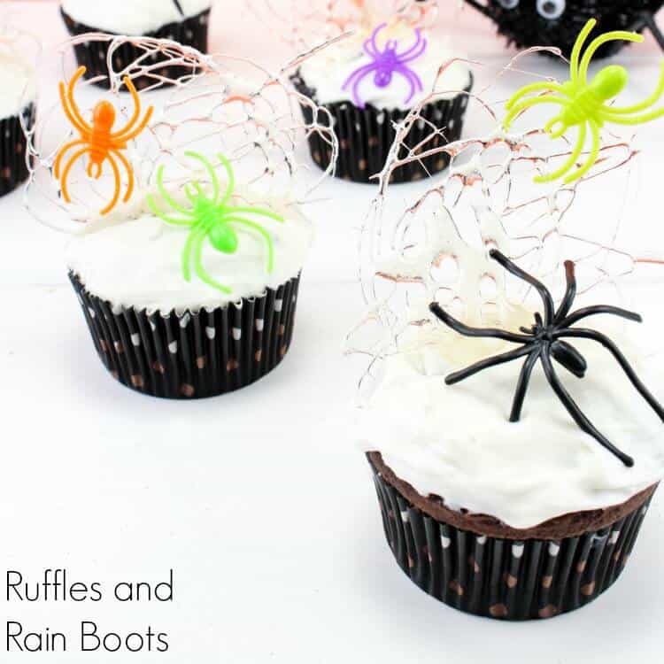 Spider cupcakes with sugar spun web s Spooky Treat Ideas