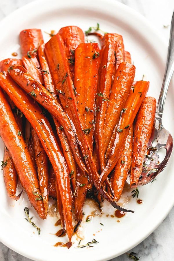 24 Best Thanksgiving Sides You'll Make Every Year 63 24 Best Thanksgiving Sides You'll Make Every Year oven roasted carrots recipe 600x900 1 Thanksgiving Sides