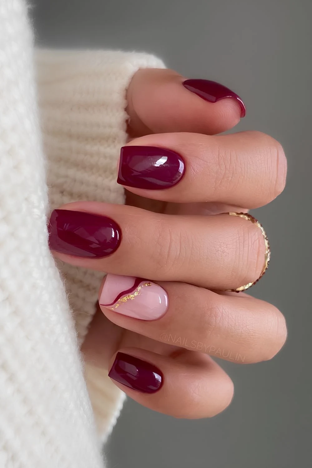 Burgundy nails with accent gold lines.jpg Burgundy Nail Ideas
