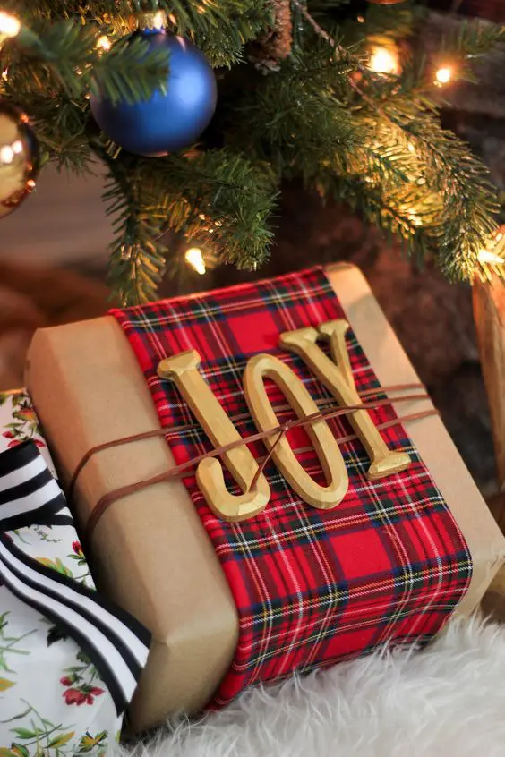 02 add plaid fabric to kraft paper JOY letters and twine Christmas Gift Wrapping Ideas