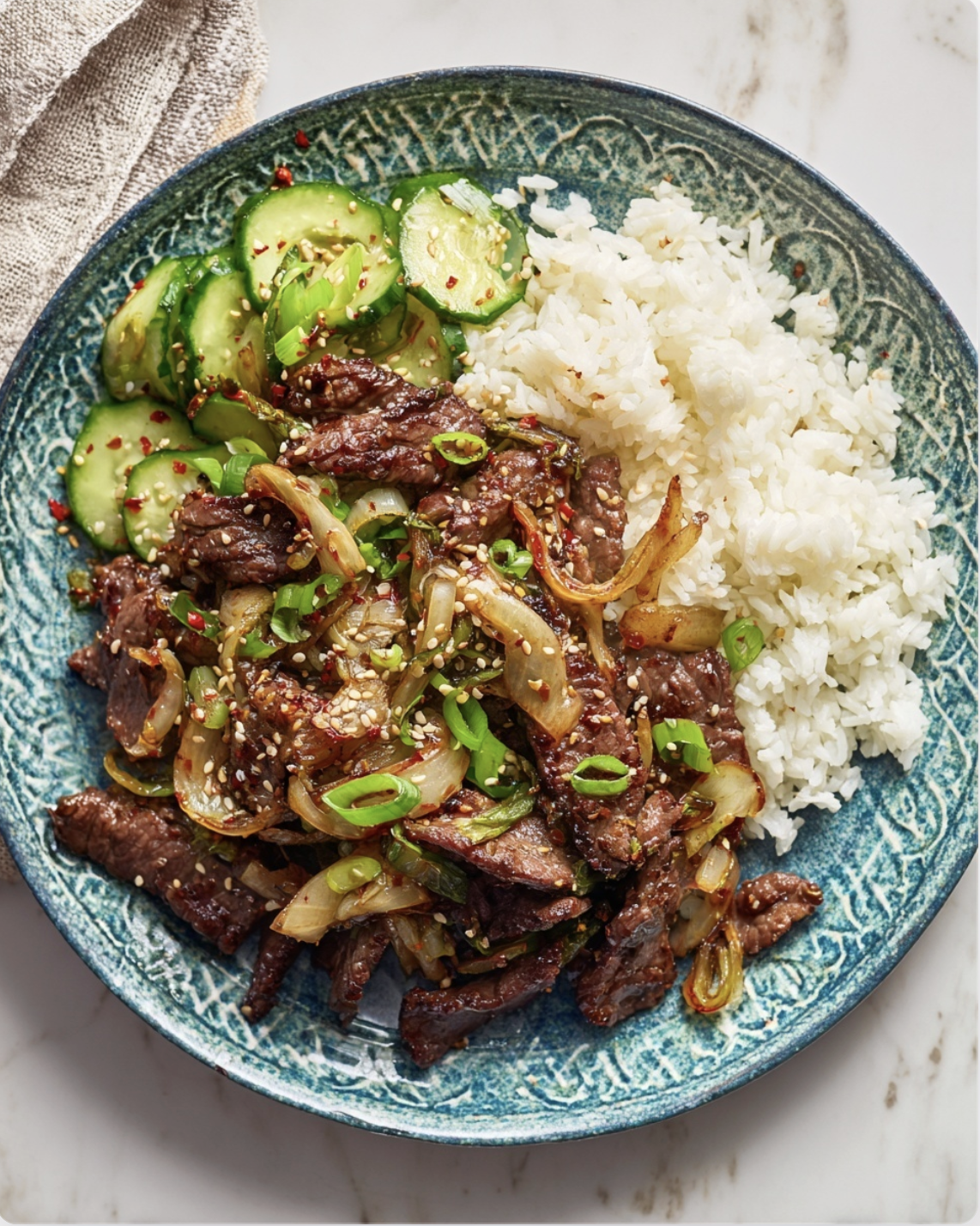 Korean Beef Bulgogi3 Korean Beef Bulgogi with Rice and Cucumber Salad