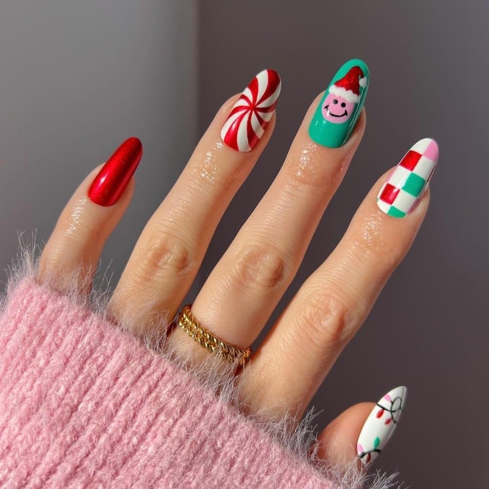 Christmas almond nails featuring a nutcracker soldier, green ribbon bows, and red and white candy cane stripes