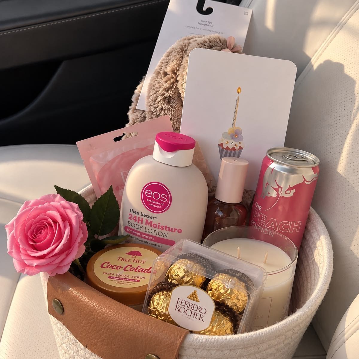 30 Thoughtful Christmas Gift Basket Ideas for Her 81 30 Thoughtful Christmas Gift Basket Ideas for Her Cream gift basket with pink roses, eos lotion, chocolates, a candle and beauty treats
