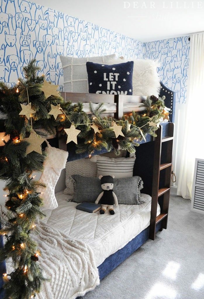 24 Magical Christmas Kids Bedroom Ideas They'll Absolutely Love 62 24 Magical Christmas Kids Bedroom Ideas They'll Absolutely Love Christmas bunk beds decorated with greenery and hanging gold stars