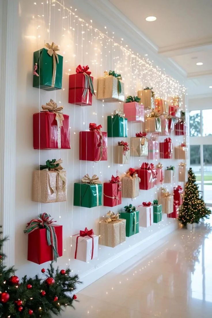 Christmas office wall decorated with colourful wrapped gift boxes and cascading fairy lights