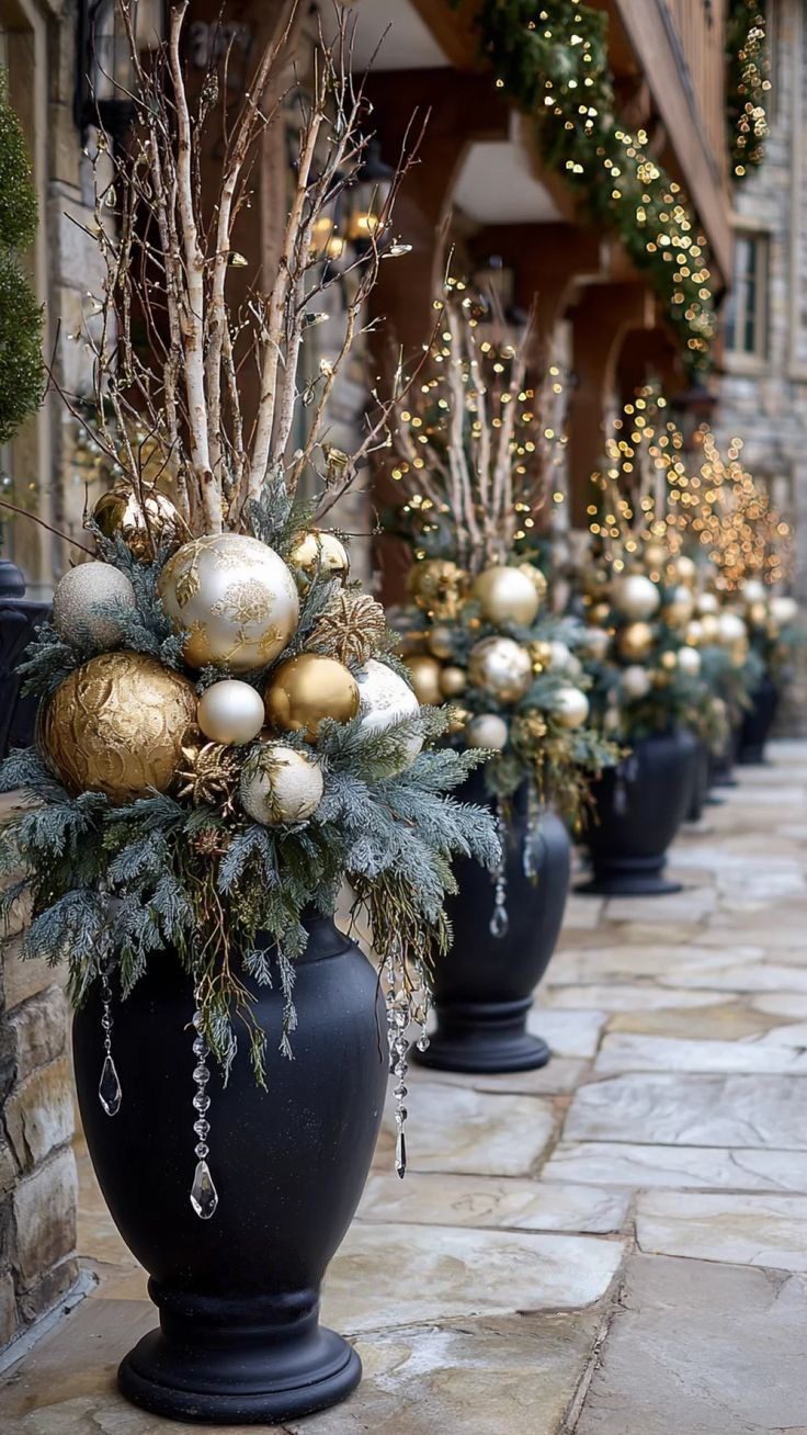 Christmas planter with oversized candy cane picks, glowing lights, red berries and evergreen branches