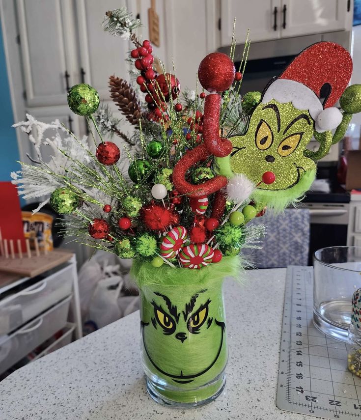 24 Easy DIY Grinch Centerpieces for a Whoville-Inspired Christmas 62 24 Easy DIY Grinch Centerpieces for a Whoville-Inspired Christmas grinch centerpieces11 DIY Grinch Centerpieces