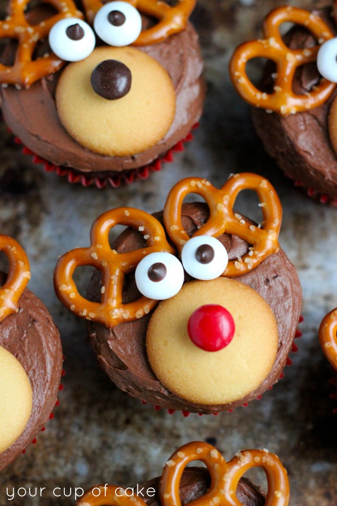 24 Easy & Creative Christmas Cupcakes to Try Right Now 57 24 Easy & Creative Christmas Cupcakes to Try Right Now Chocolate reindeer cupcake with pretzel antlers, candy eyes, and a red raspberry nose